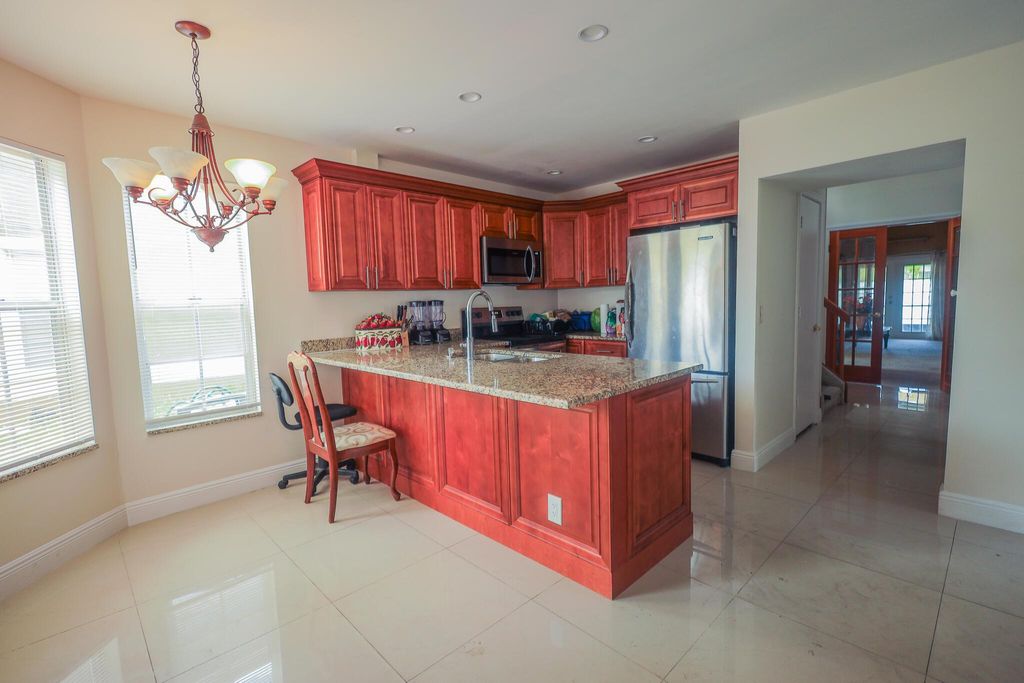 Photo of 1356 Climbing Rose Lane, West Palm Beach, FL 33415 (MLS # R11114022)