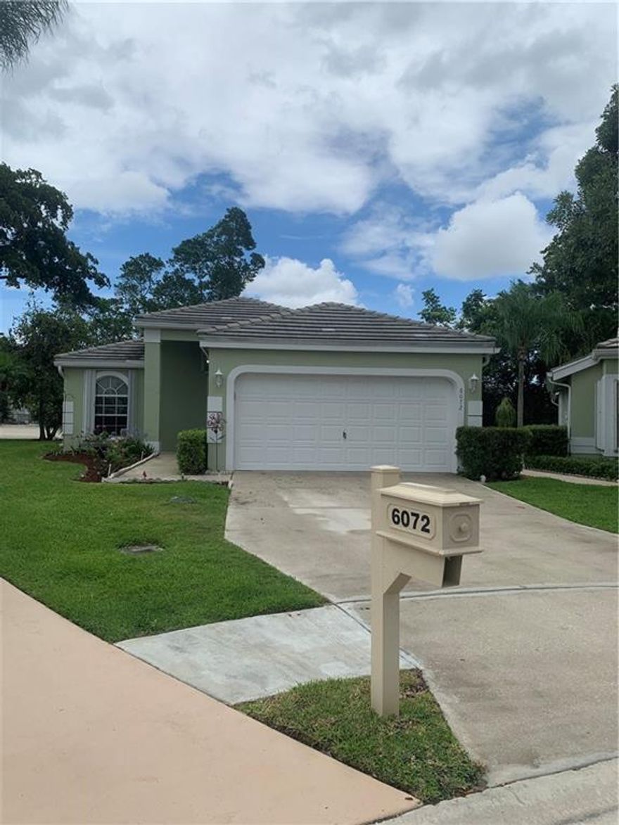 MOVE IN READY HOME , fresh on the market in gated community of Lacuna Golf Club. This 2 bed, 2 bath home is ready for it's new owners. This residence has majority of the upgrades already done for you. Sitting on a quiet cul-de-sac, you can have peace and quiet with the golf course behind you for ultimate relaxation. The home has a 2 car garage, 12 foot ceilings, spacious rooms, walk-in closets, and tons of natural light flowing through it. The home has a full generac generator that will run the entire house in case of a storm. BRAND NEW AC put in June 2022. Brand new tile roof 2017, accordion shutters for each window/door opening, with partial impact glass. Tile throughout with plush, clean carpet in bedrooms. Enclosed porch with new screening, and the list goes on. Priced to sell today.