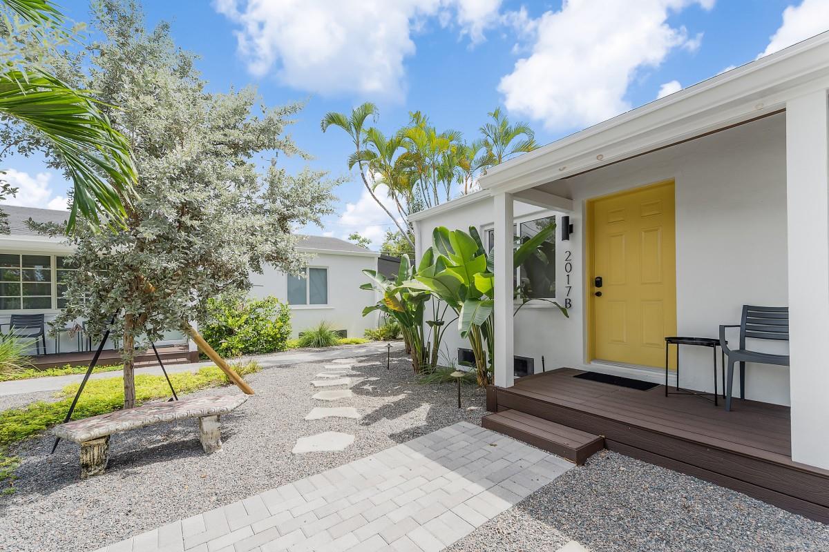 Charming STUDIO w full kitchen and bathroom in small gated community in Hollywood - Furnished option available for an additional $65/month. Beautifully renovated studio in a Key West-style gated community with lush tropical landscaping. Features impact windows, stainless steel fridge and stove, granite countertops, mini-split AC, front balcony, secure entry, and on-site laundry. Close to entertainment, restaurants, shopping, transportation.