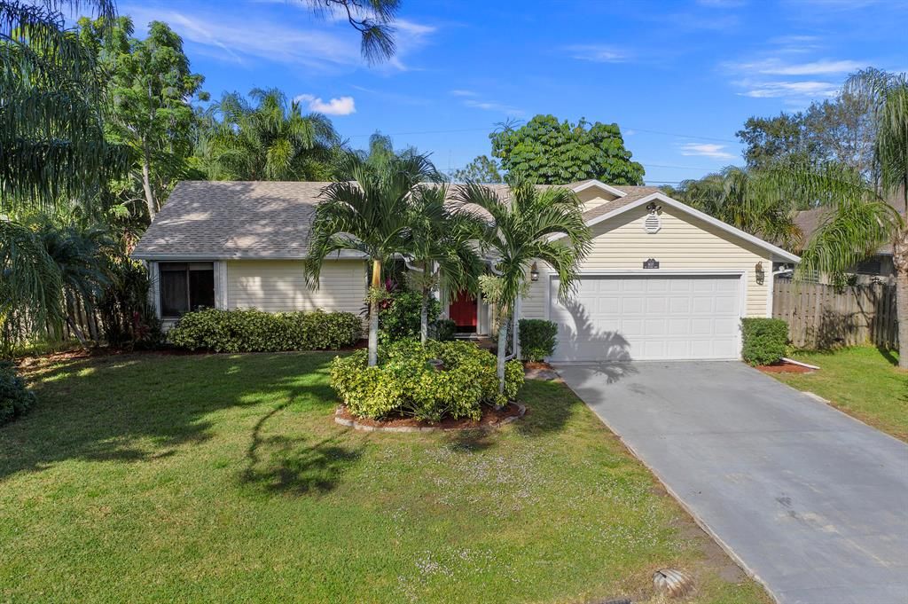 Photo of 1637 SW Escobar Lane, Port Saint Lucie, FL 34953 (MLS # R10764725)