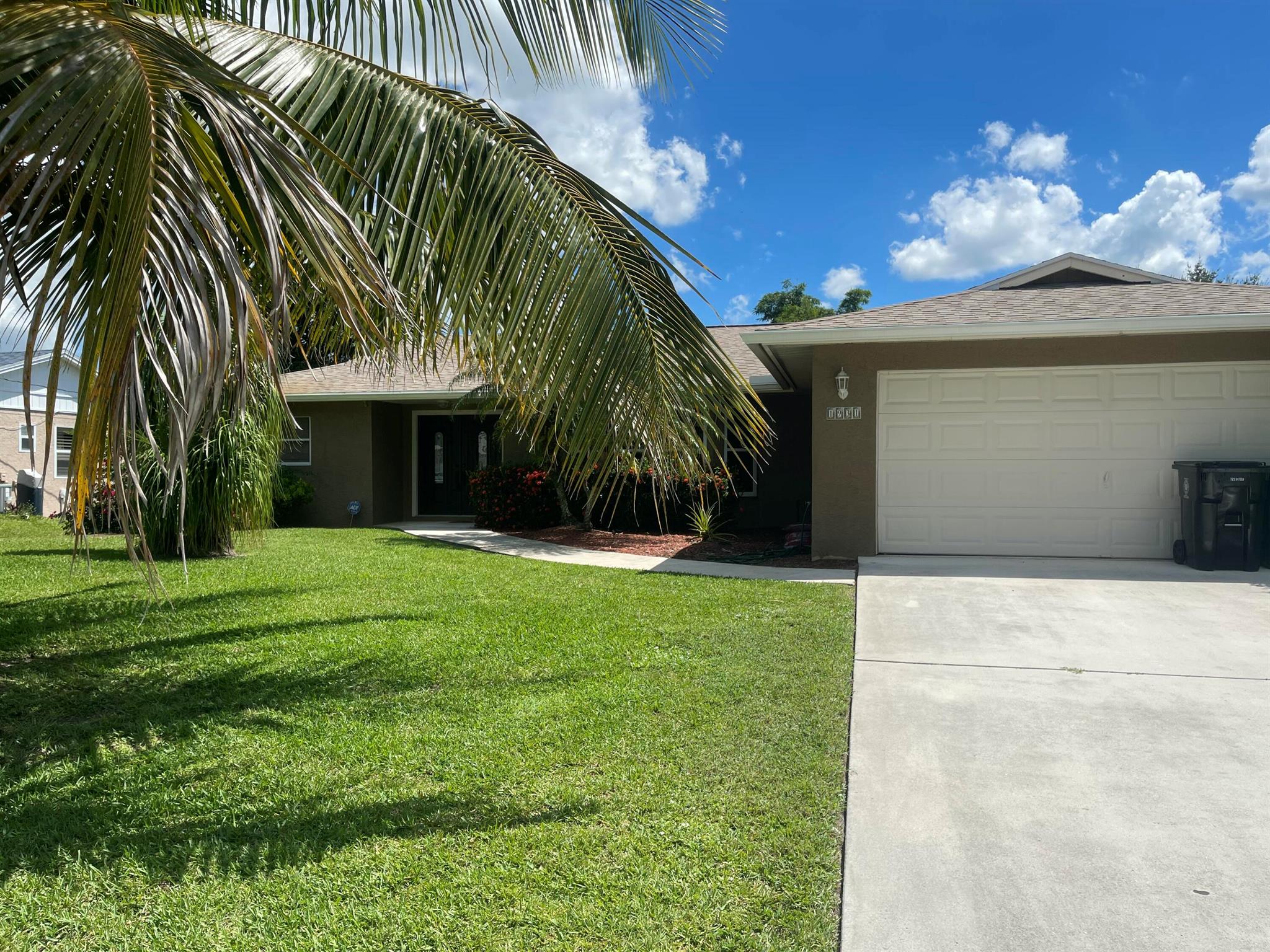Step into this inviting 3 bedroom, 2 bath home in Bayshore Heights, where comfort is the key. This well maintained home has nearly 1,900 sq fr under air, and the home feels open and airy with the voluminous ceilings and skylights. The spacious kitchen with Stainless Steel appliances and a spacious pantry makes cooking and gathering easy. The kitchen island and the kitchen countertops are granite and easy to clean. The dining room off of the kitchen with easy access to the 11 X 17 screened in porch creates a seamless indoor-outdoor flow. The owner's suite is quite large, with a walk in closet, walk in shower, and double vanities. Guest bedrooms are comfortably sized and a cabana bath with a tub and shower combo, skylight and a door leading