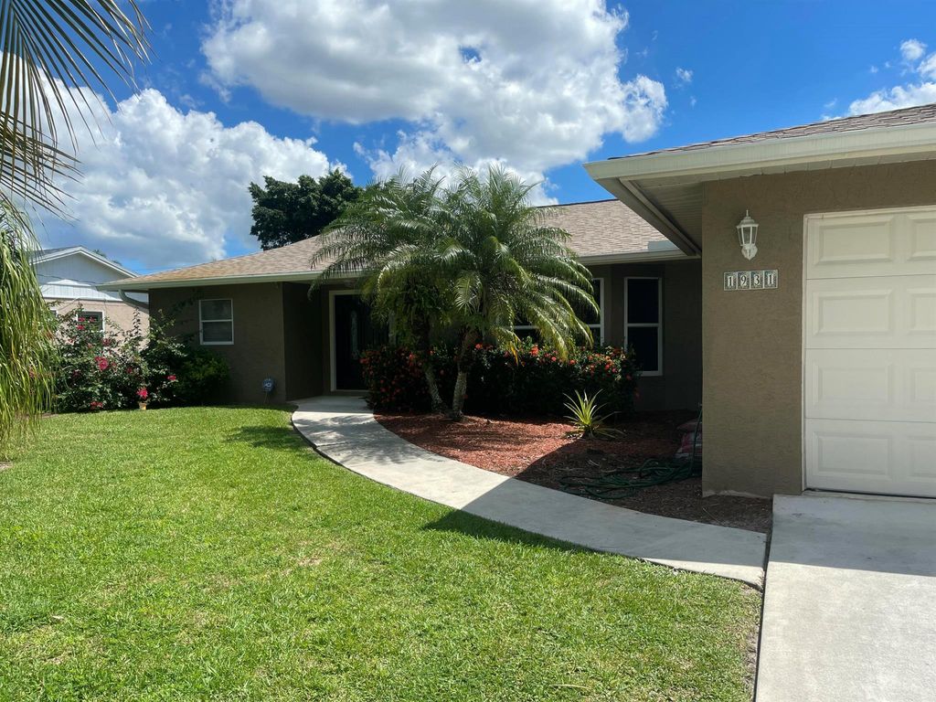 Photo of 1931 SW Brisbane Street, Port Saint Lucie, FL 34984 (MLS # R11116321)