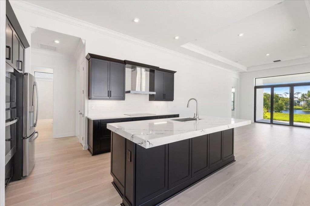 Photo of 116 SE Cortile Enza, Port Saint Lucie, FL 34952 (MLS # R11129121)