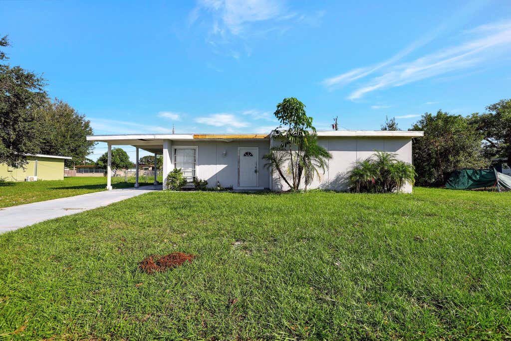 Photo of 109 SE Calmoso Drive, Port Saint Lucie, FL 34983 (MLS # R11029190)