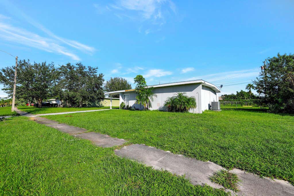 Photo of 109 SE Calmoso Drive, Port Saint Lucie, FL 34983 (MLS # R11029190)