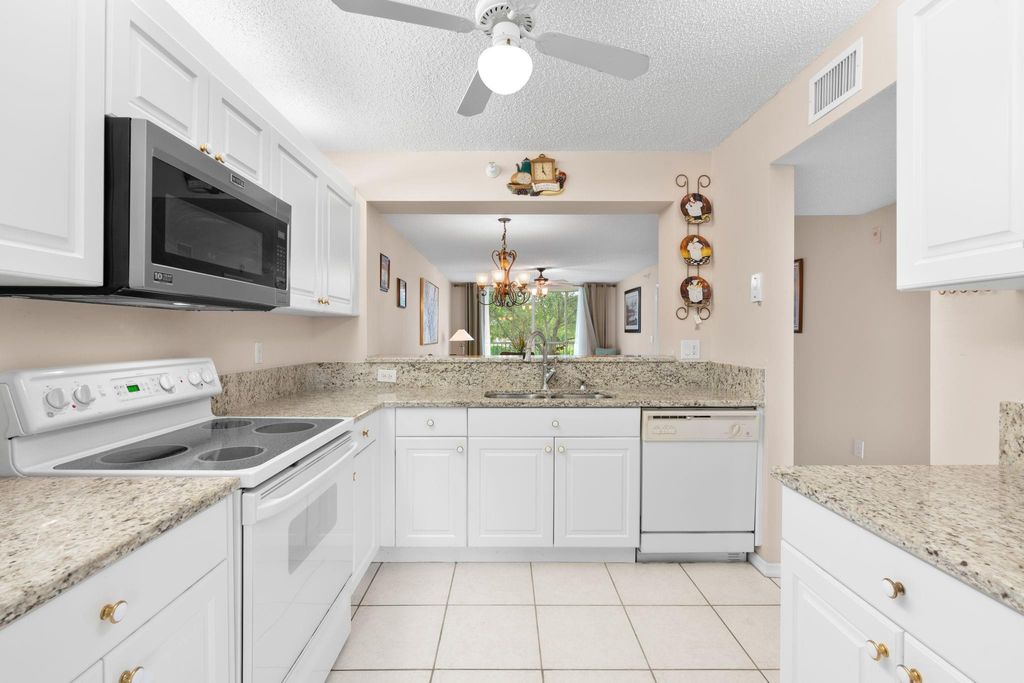 Photo of 7763 Southampton Ter #215, Tamarac, FL 33321 (MLS # F10538772)