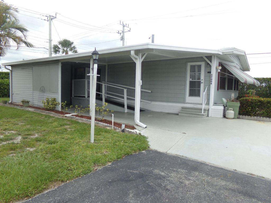 Photo of 57006 Antilles, Boynton Beach, FL 33436 (MLS # B26038069)