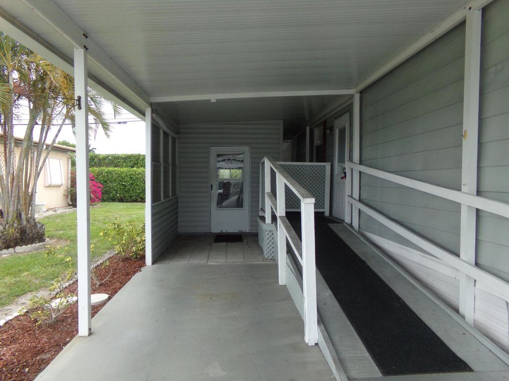 Photo of 57006 Antilles, Boynton Beach, FL 33436 (MLS # B26038069)