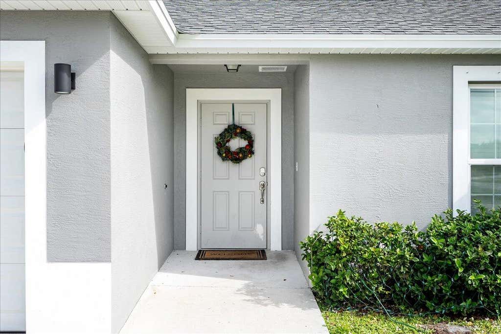 Photo of 1791 SW Gloria Lane, Port Saint Lucie, FL 34953 (MLS # R10945375)