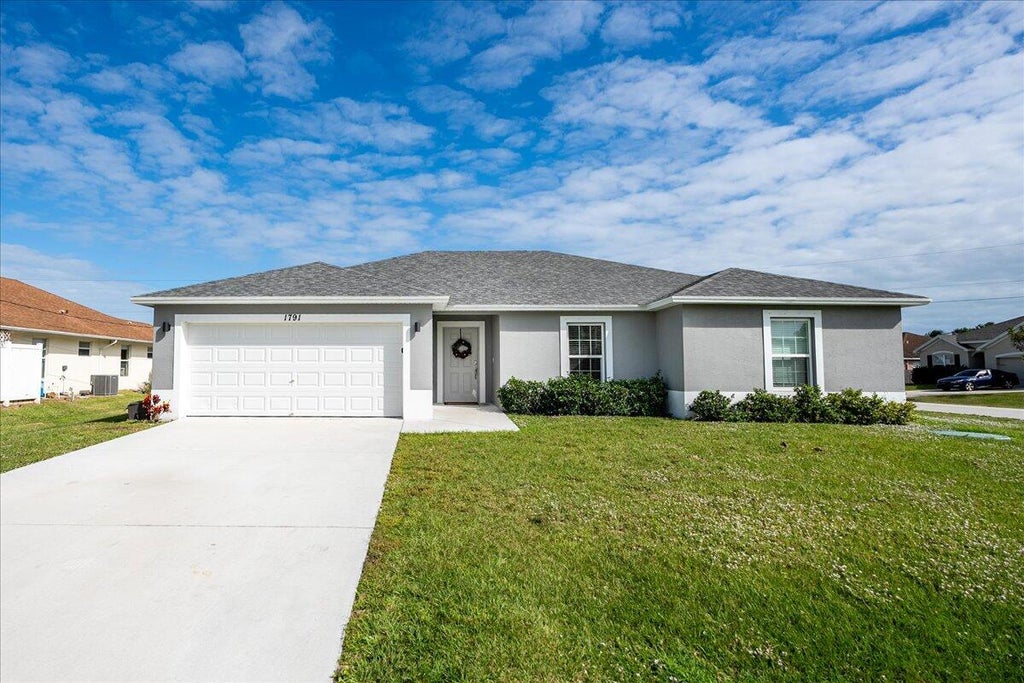Photo of 1791 SW Gloria Lane, Port Saint Lucie, FL 34953 (MLS # R10945375)