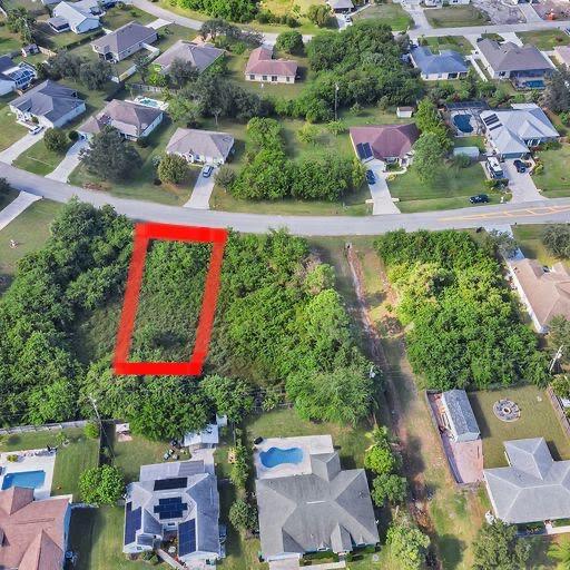 Port St Lucie residential lot waiting for you to build your new home. This .28 acre property sits on a paved road just off Becker, near Florida Turnpike and retail stores. Adjacent lot is also available, listed separately.