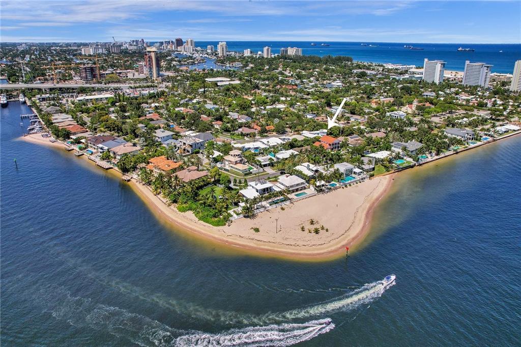 This gem is situated about 1 mi south of Ft. Lauderdale Beach Park & just a few blocks from Points of America's Beach, providing exclusivity & tranquility. The reimagined Pier 66 social marina will bring elite spa services & restaurants, where you can indulge in the finest cuisine & pamper yourself in a serene waterfront setting steps away. Less than 5 miles to the airport & across the intracoastal, you'll find the bustling ports, allowing for convenient travel & exciting adventures. Also just 2 mi away, the vibrant heart of Las Olas offering a plethora of upscale boutiques, art galleries & entertainment options at your finger tips. Additionally, the F3 Marina is just 1 mile away, catering to boating enthusiasts & providing easy access to the stunning Intracoastal Waterway.