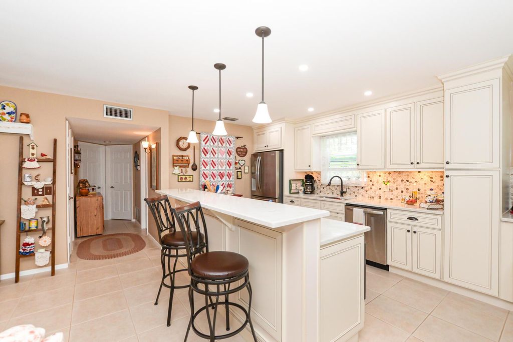 Photo of 31 Lake Vista Trail #101, Port Saint Lucie, FL 34952 (MLS # R10959727)