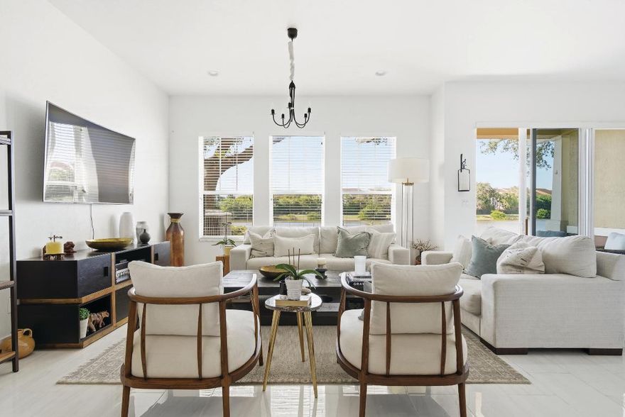 Beautifully renovated two-story residence in the gated CitySide Community, located in the heart of West Palm Beach. This move-in-ready home offers serene lake views and a thoughtfully updated interior with modern finishes throughout. 

CitySide is a resort-style community featuring a pool, fitness center, clubhouse, and walking paths. Just minutes from Downtown West Palm Beach, CityPlace, Clematis Street, and the Intracoastal, with endless shopping, dining, and entertainment nearby. Palm Beach International Airport is approximately 3 miles away, making travel effortless. Enjoy urban convenience paired with a tranquil community setting—this is West Palm living at its best.