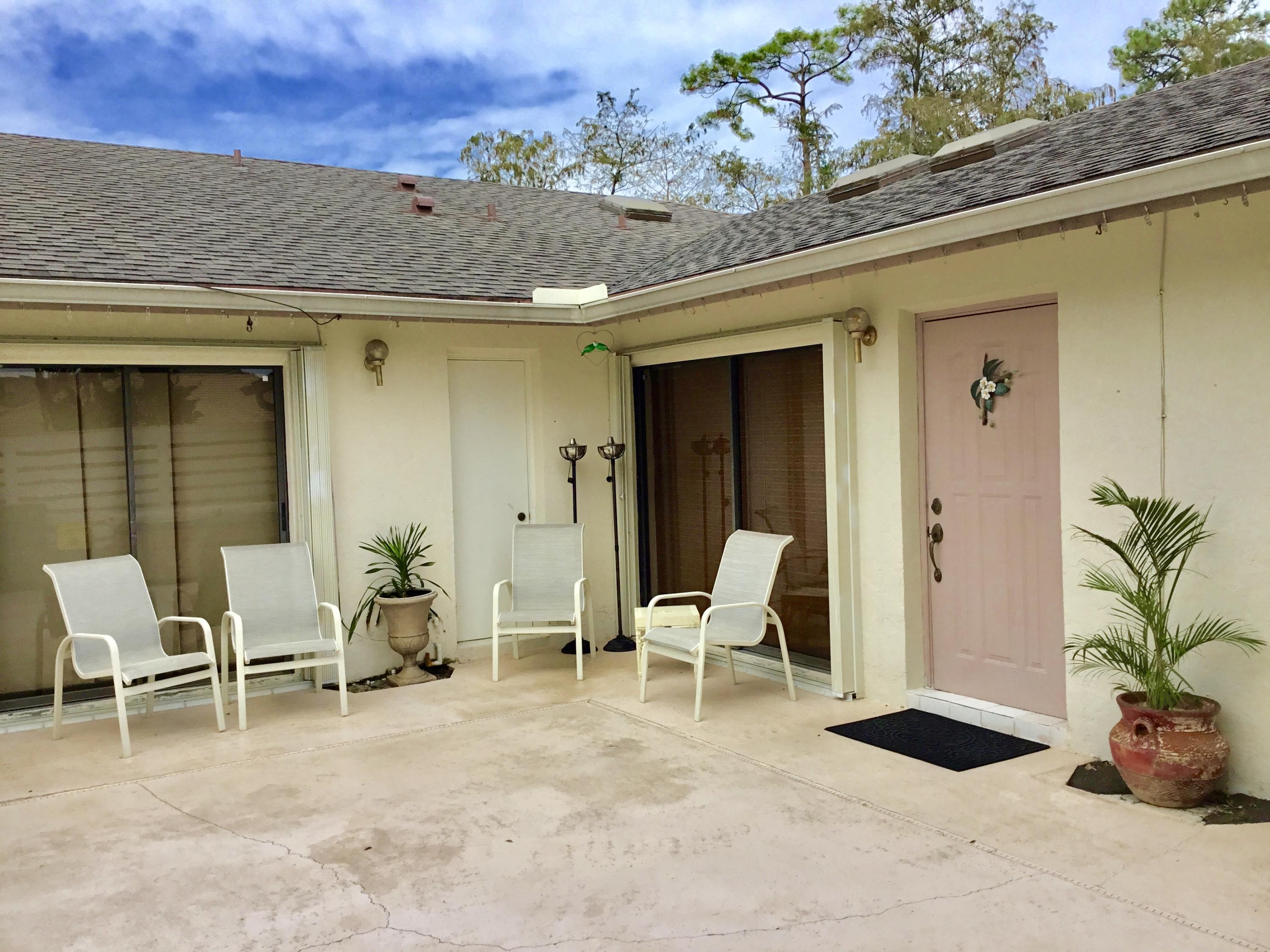 Clean and charming this 2br/2bath unit has tons of natural light, two parking spots, upgraded appliances, stackable washer/dryer and private outdoor patio. Complete with linens, towels, glasses, flatware and cookware. Located across the street from Publix and shopping plaza. Showings to begin Sep 28, 2017