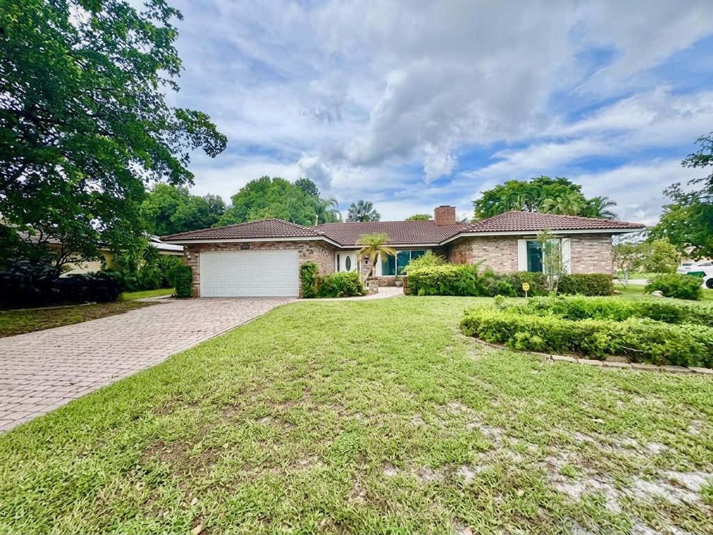 Photo of 2022 NW 112th Avenue, Coral Springs, FL 33071 (MLS # B26057794)