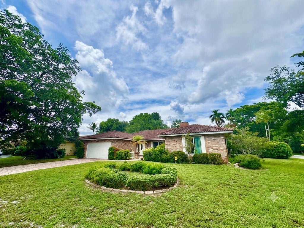 Photo of 2022 NW 112th Avenue, Coral Springs, FL 33071 (MLS # B26057794)