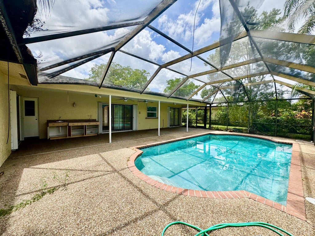 Photo of 2022 NW 112th Avenue, Coral Springs, FL 33071 (MLS # B26057794)