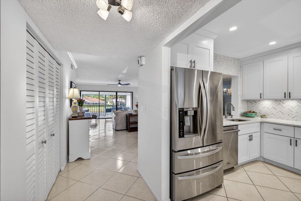 Photo of 12871 Briarlake Drive #203, Palm Beach Gardens, FL 33418 (MLS # R11168643)