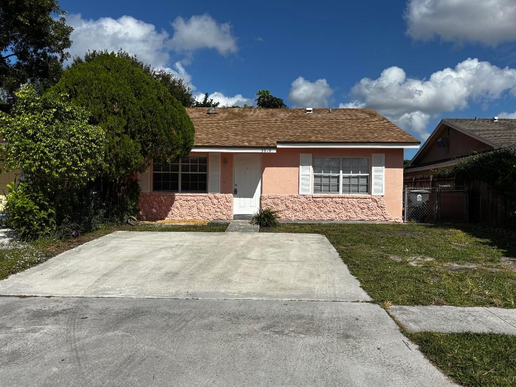 Photo of 3919 Wilshire Street, West Palm Beach, FL 33403 (MLS # R11139327)