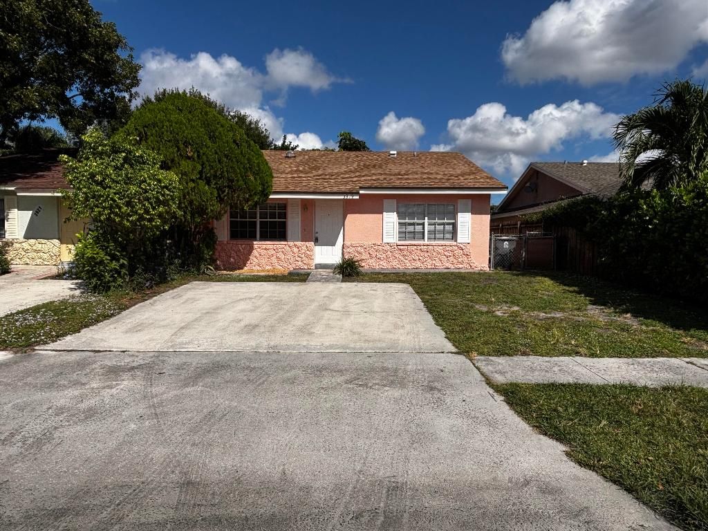 Photo of 3919 Wilshire Street, West Palm Beach, FL 33403 (MLS # R11139327)