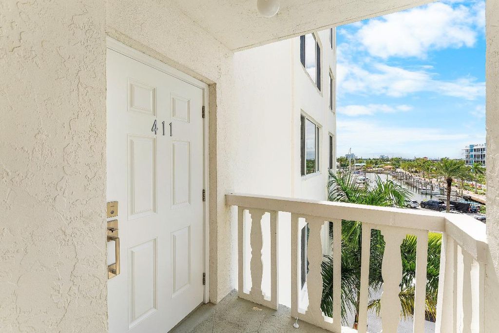 Photo of 301 Lake Shore Drive #411, Lake Park, FL 33403 (MLS # R11131091)