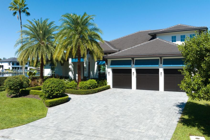 Call for private viewing, Gorgeous 2019 Construction Corner Lot located on the water in Pirates Cove.  Breathtaking masterpiece with versatile modern open space floor-plan in the heart of PBG just off PGA Blvd.  Boasting over 259' of Seawall, beautiful wide water views of large bay.  Spacious floor plan includes a Master on first with wet bar. Luxurious features throughout home includes Dbl Pane Low E Impact Windows, The state-of-the-art Dream Kitchen, 9' oversized island, 48'' 6 burner Gas stove, 3 ovens, Stand alone freezer and fridge all overlooking the impressive 40'X43'. Great Room with views beyond, Oversized 3 Car Garage & Xtra Storage.