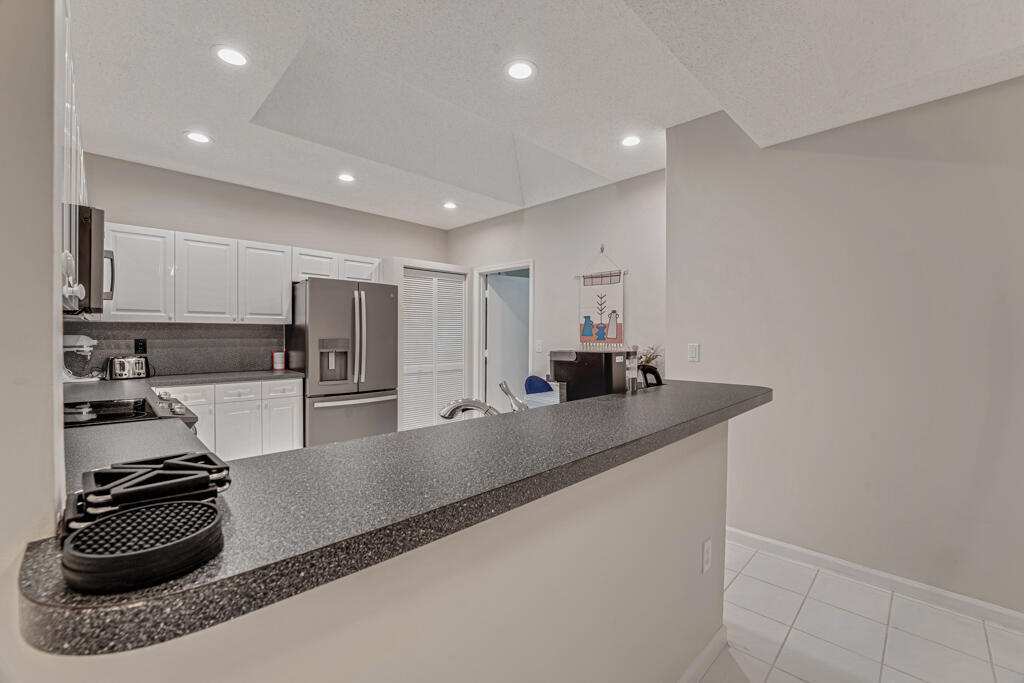 PALM ISLES I, II AND III CONDOS - Residential