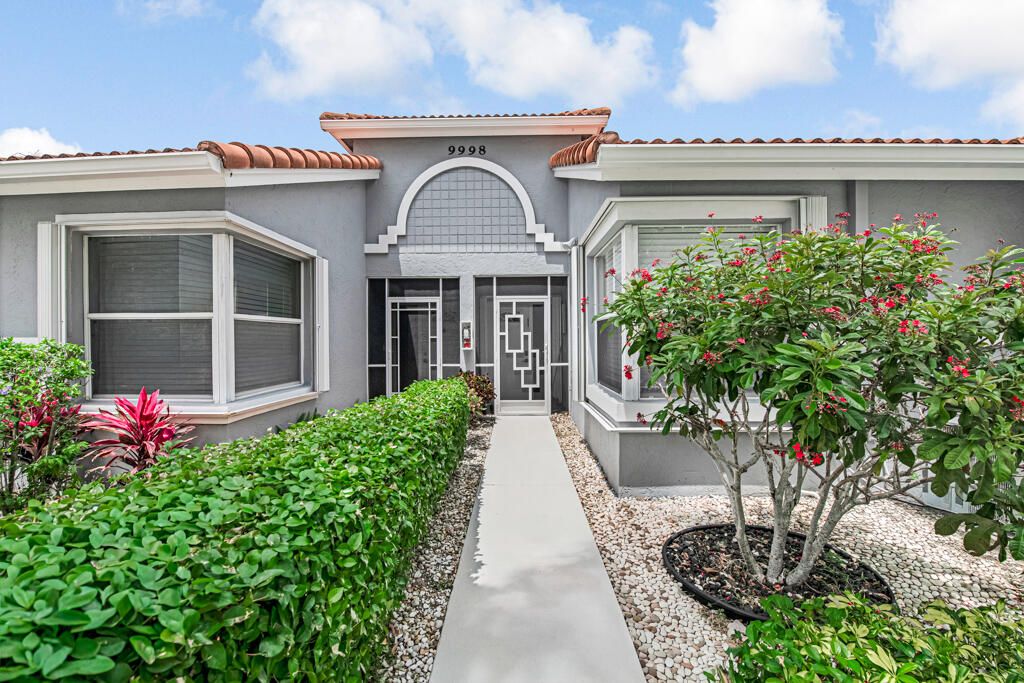 Photo of 9998 Seacrest Circle #C, Boynton Beach, FL 33437 (MLS # B26016294)