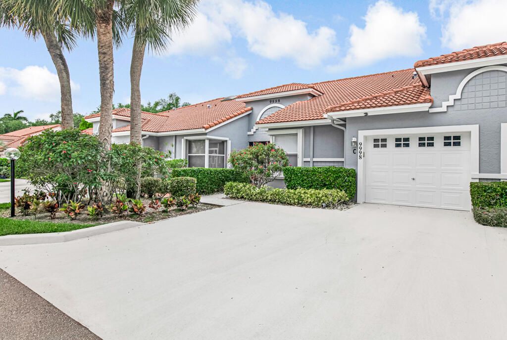 Photo of 9998 Seacrest Circle #C, Boynton Beach, FL 33437 (MLS # B26016294)