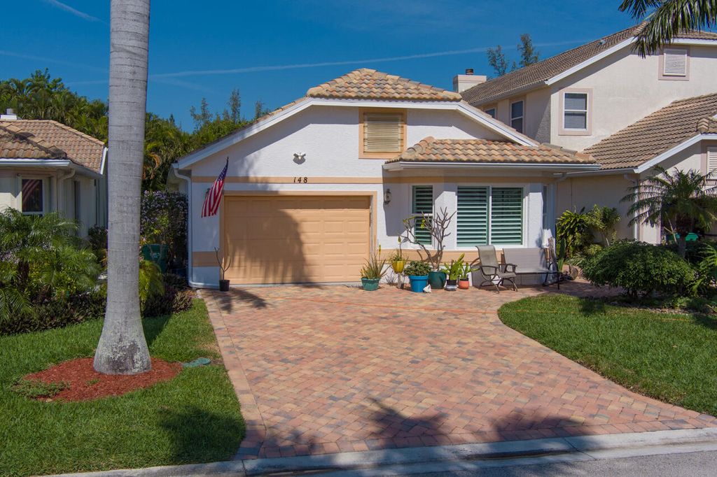 Photo of 148 Pepper Lane, Jensen Beach, FL 34957 (MLS # R10869729)