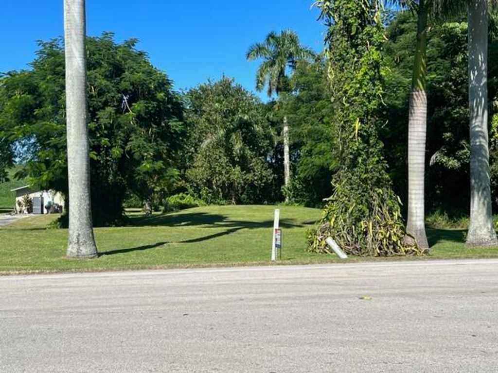 Photo of 2251 E Main Street, Pahokee, FL 33476 (MLS # R10929729)