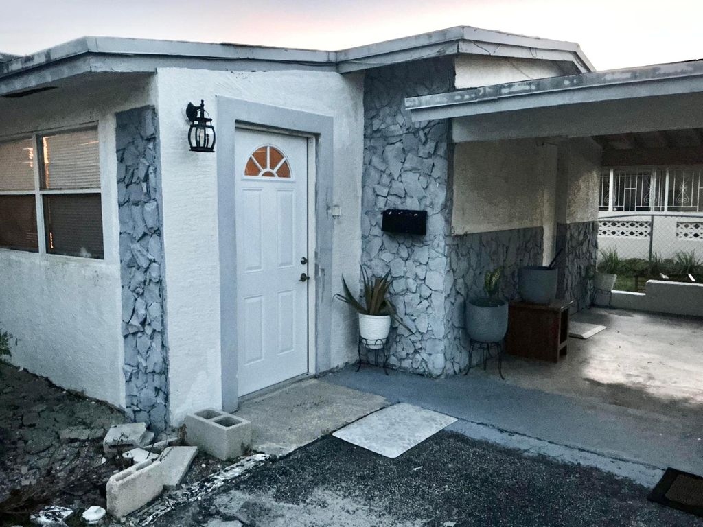 Photo of 1201 NW 51st Avenue, Lauderhill, FL 33313 (MLS # B26027493)