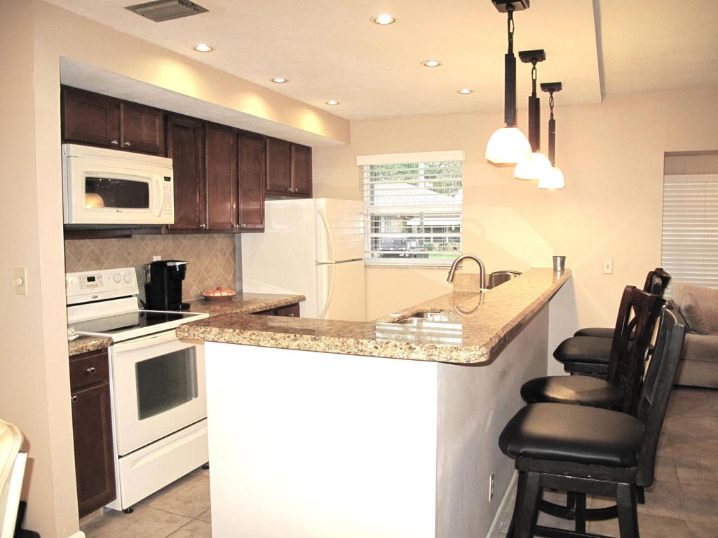 Photo of 1315 SE High Point Way Way SE #B, Delray Beach, FL 33445 (MLS # B26005233)