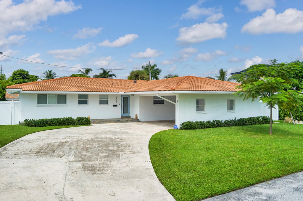 Photo of 2607 COLGATE Lane, Lake Worth Beach, FL 33460 (MLS # B26084765)