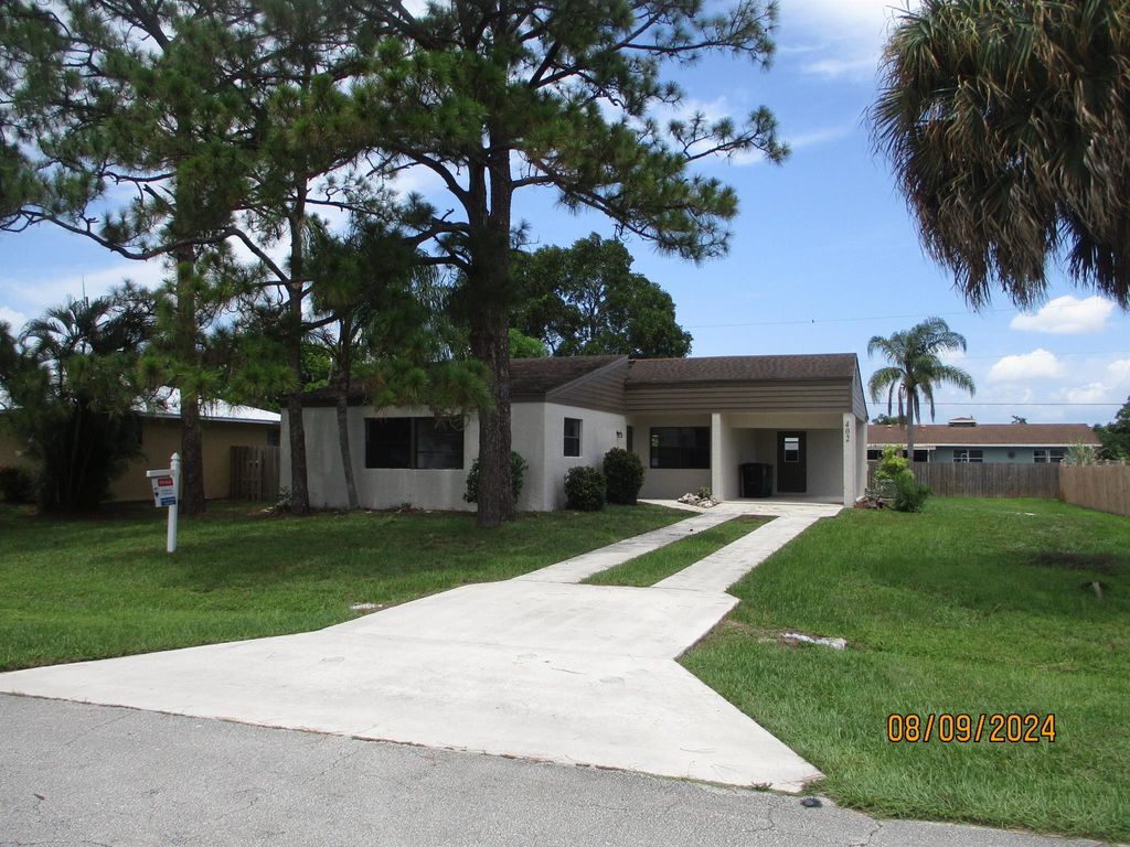 Photo of 402 SE Calmoso Drive, Port Saint Lucie, FL 34983 (MLS # R11011444)