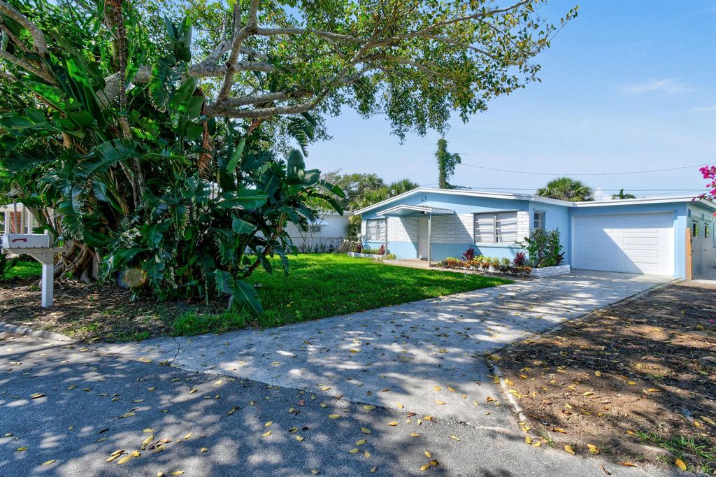 Photo of 450 Neptune Road, Juno Beach, FL 33408 (MLS # R10991939)