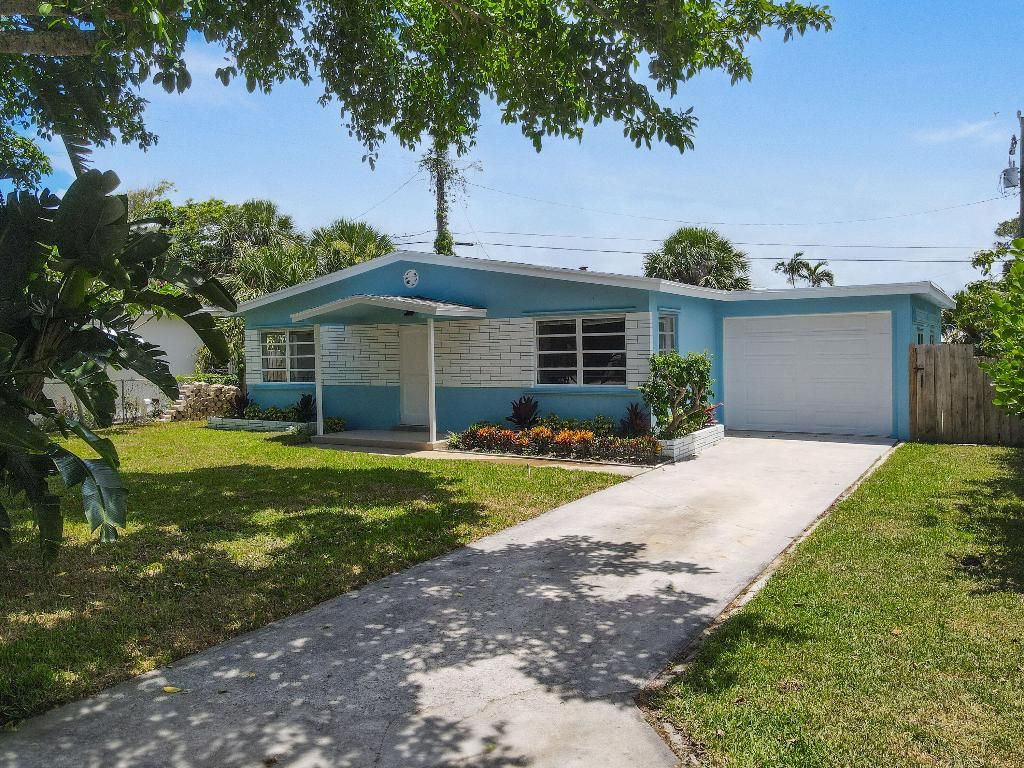 Photo of 450 Neptune Road, Juno Beach, FL 33408 (MLS # R10991939)