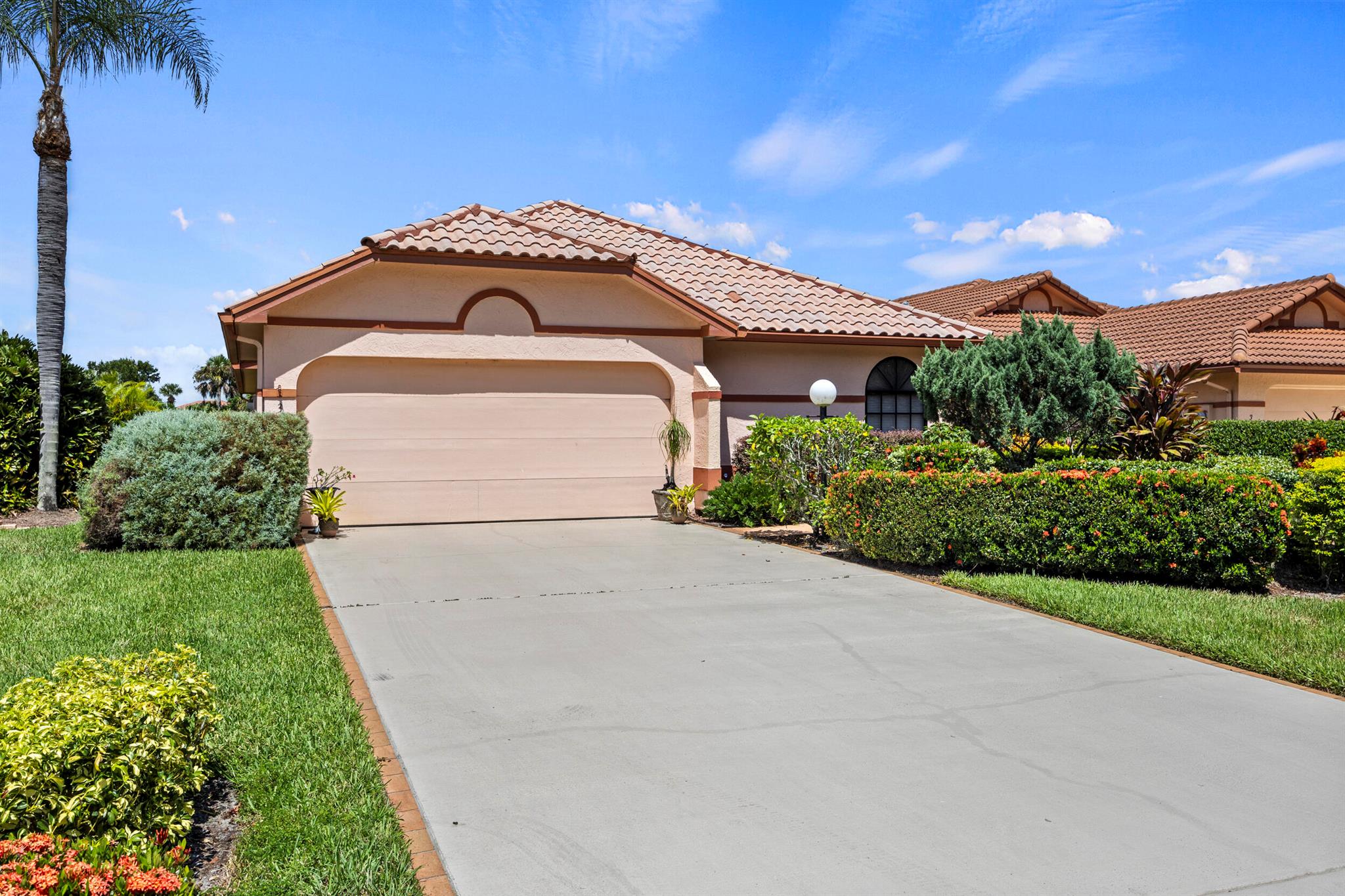 Well maintained 2 bed, 2 1/2 bath + DEN home With peaceful golf course views. located on the Martin Downs Golf Course.**No membership required in this gated community. Has Renovated Kitchen, vaulted ceilings The den/office can easily serve as a 3rd bedroom when you have guests.The spacious primary suite features his & hers closets plus a large walk-in closet.Has an eat-in kitchen, separate dining area, Large Family room leading to the and huge screened patio. You'll love this private hidden neighborhood, close to everything.