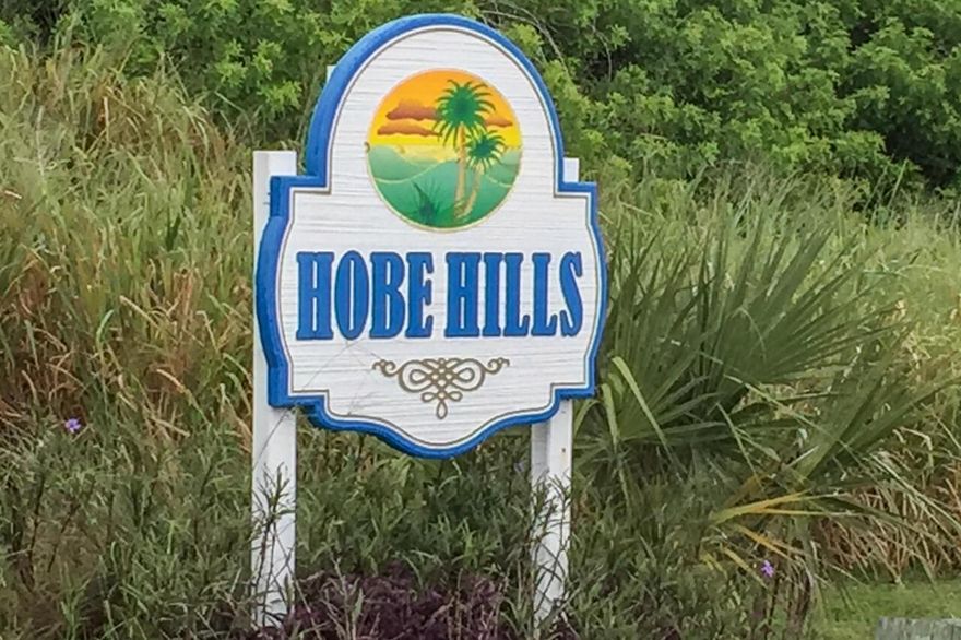 1/2 acre backing up to Jonathan DickinsonState Park!  Rare Find.  104' x 208' Well & Septic.NO HOA! Close to Beach.