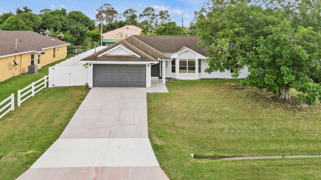Photo of 1542 SW Dycus Avenue, Port Saint Lucie, FL 34953 (MLS # R11144552)