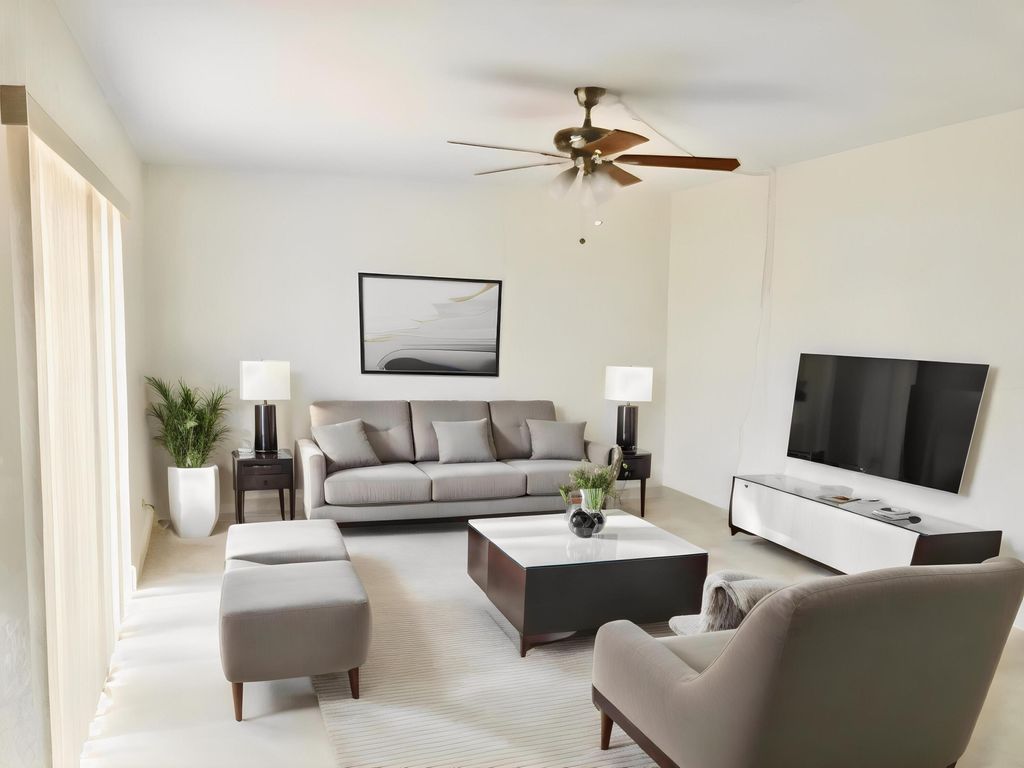 Photo of 313 Lake Arbor Drive, Palm Springs, FL 33461 (MLS # R10950053)