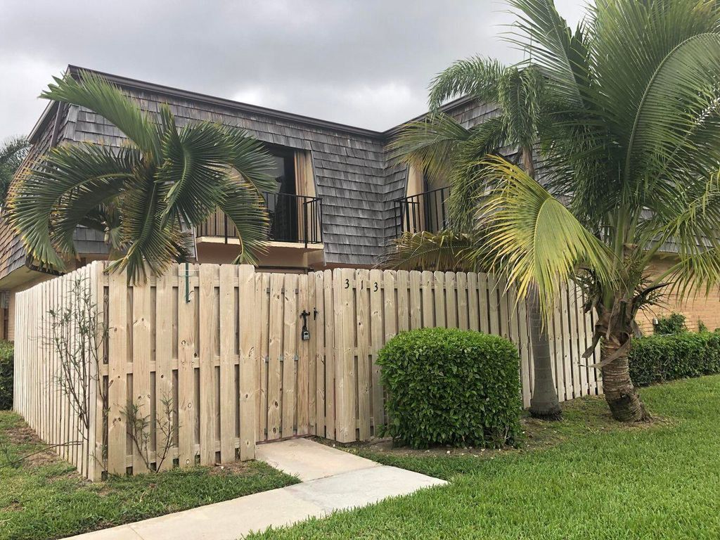 Photo of 313 Lake Arbor Drive, Palm Springs, FL 33461 (MLS # R10950053)
