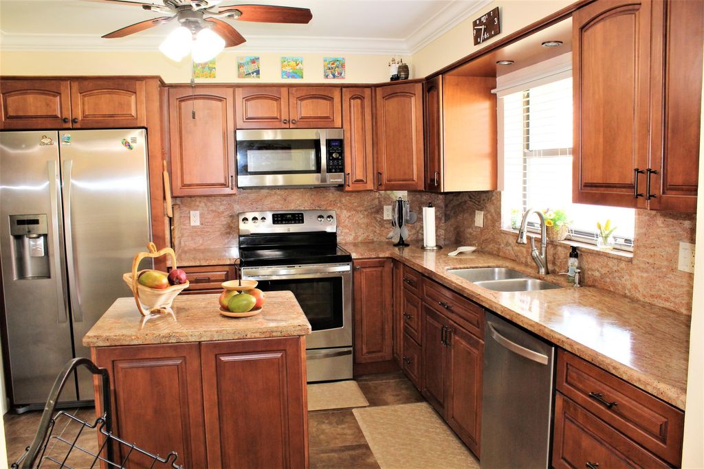 Photo of 9940 Bauhinia Tree Way #B, Boynton Beach, FL 33436 (MLS # B26009396)