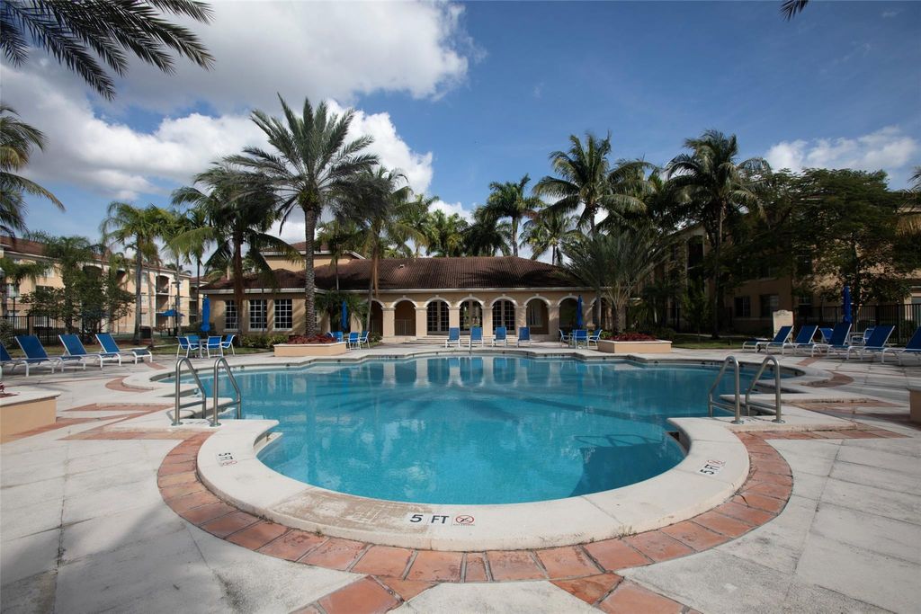 Photo of 4768 W Atlantic Blvd #3-208, Coconut Creek, FL 33063 (MLS # F10523655)