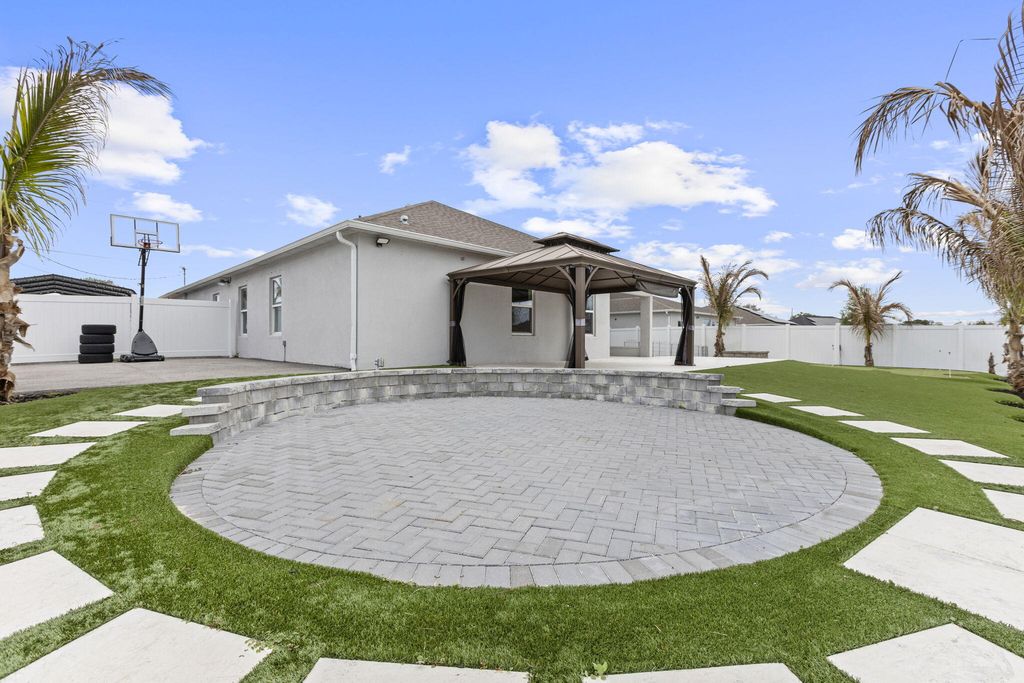 Photo of 681 SW Millard Drive, Port Saint Lucie, FL 34953 (MLS # B26013406)