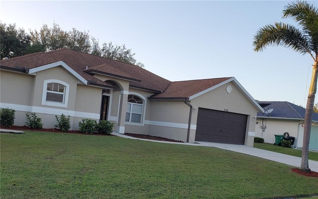 Photo of 2526 SW Deckard Street, Port Saint Lucie, FL 34953 (MLS # F10307741)