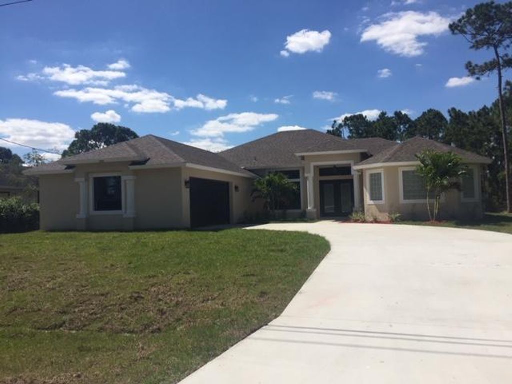Photo of 2530 SW National Circle, Port Saint Lucie, FL 34953 (MLS # R10696380)
