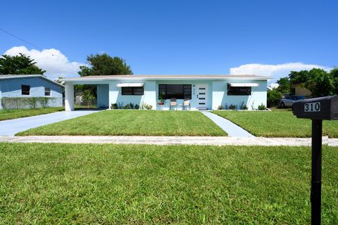 Photo of 310 W 16th Way, Riviera Beach, FL 33404 (MLS # R11125294)