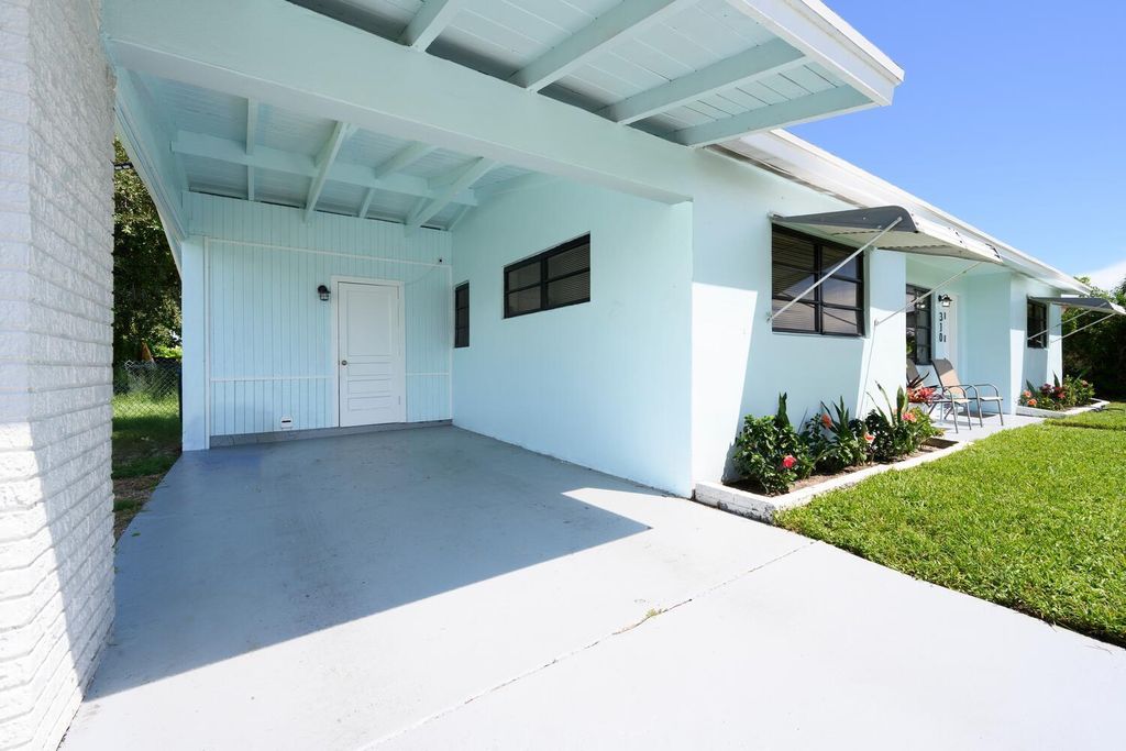 Photo of 310 W 16th Way, Riviera Beach, FL 33404 (MLS # R11125294)